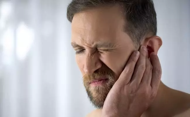 A Person Facing Pain In An Ear